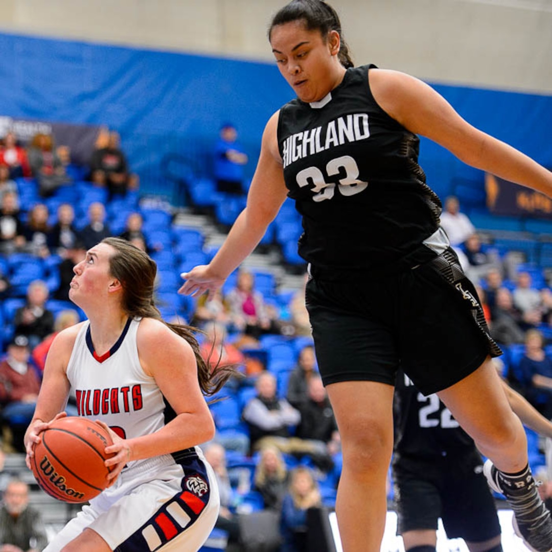 (Trent Nelson | The Salt Lake Tribune)  Woods Cross's Allee Mckenna (2) defended by Highland's Kaija Glasker (22) as Woods Cross faces Highland in the 5A High School Girls' Basketball Tournament at SLCC in Taylorsville, Wednesday Feb. 21, 2018.
