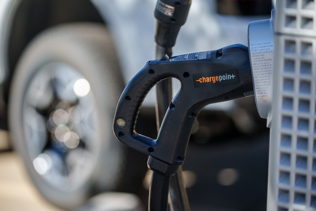 (Trent Nelson | The Salt Lake Tribune) An EV charging station at the Utah Department of Environmental Quality in Salt Lake City in October 2022. Salt Lake City may require developers to supply the infrastructure for more charging stations at their apartment and condo complexes.