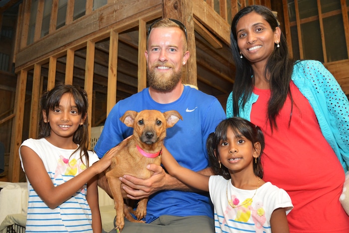 Best Friends Animal Society staff members and volunteers help rescue and reunite pets with people in the aftermath of Hurricane Harvey. Courtesy | Best Friends Animal Society.