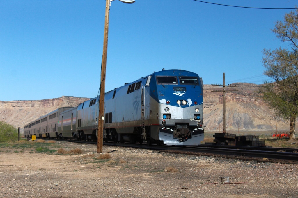 (Sophia Fisher | The Times-Independent) An Amtrak train cruises through Thompson Springs in April 2022. The town lost its train station several decades ago; now, the nearest one to both Thompson and Moab is in Green River.