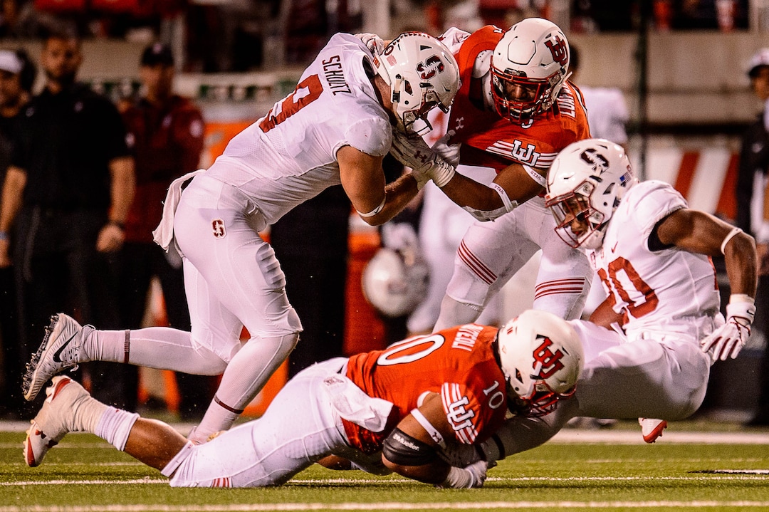 (Trent Nelson | The Salt Lake Tribune)  Utah Utes linebacker Sunia Tauteoli (10) brings down Stanford Cardinal running back Bryce Love (20) as the University of Utah hosts Stanford, NCAA football at Rice-Eccles Stadium in Salt Lake City Saturday October 7, 2017.