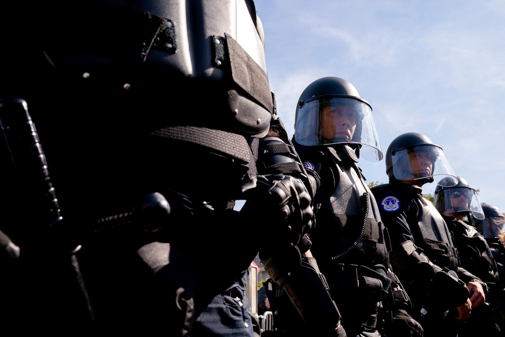 (Stefani Reynolds | The New York Times)
U.S. Capitol Police officers in riot gear keep demonstrators and counterprotesters separated during a women's march for abortion rights outside the Supreme Court in Washington, Oct. 2, 2021. "The Supreme Court on Friday issued a decision allowing abortion providers in Texas to continue challenging a new law that bans most abortions in the state after about six weeks of pregnancy," writes New York Times columnist Charles M. Blow. "But while the conservative majority didn't close the door on abortion in Texas completely, the degree to which it is cracked allows in only a sliver of light."