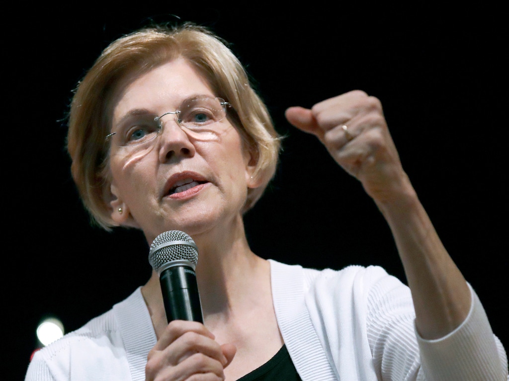 FILE - In this Wednesday, Aug. 8, 2018 file photo, U.S. Sen. Elizabeth Warren, D-Mass., speaks during a town hall style gathering in Woburn, Mass. Warren keeps popping up on short lists of possible 2020 Democratic presidential contenders, but will first face a Republican challenger as she seeks re-election in November. (AP Photo/Charles Krupa, File)