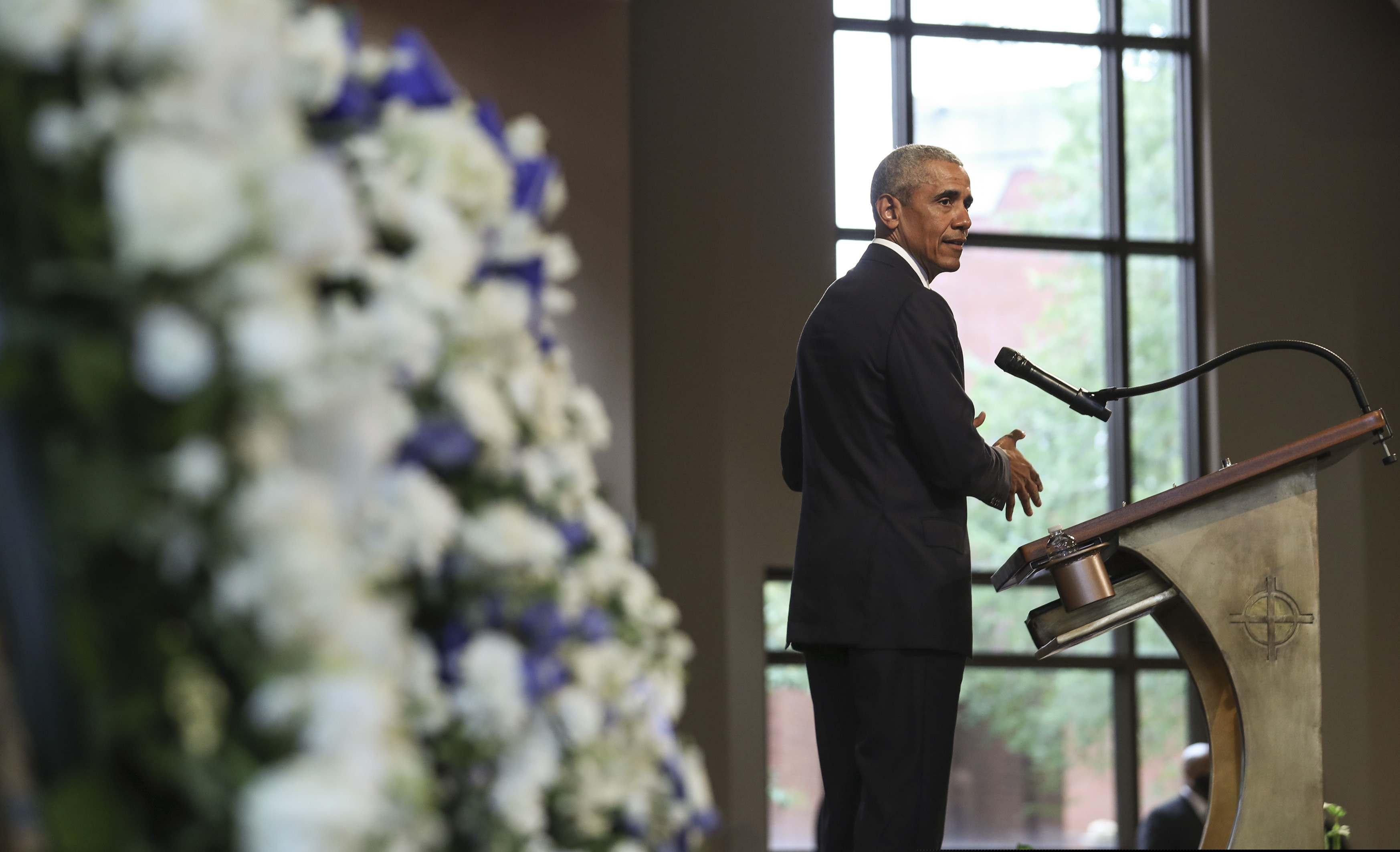 Former President Barack Obama, addresses the service during the funeral for the late Rep. John Lewis, D-Ga., at Ebenezer Baptist Church in Atlanta, Thursday, July 30, 2020. (Alyssa Pointer/Atlanta Journal-Constitution via AP, Pool)