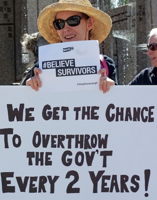 Charlotte Maloney attends a rally protesting U.S. Supreme Court nominee Brett Kavanaugh Friday, Sept. 28, 2018, in Salt Lake City. (AP Photo/Rick Bowmer)