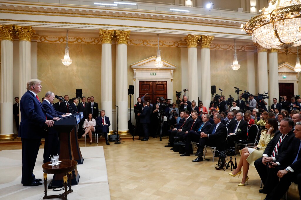 U.S. President Donald Trump, left, and Russian President Vladimir Putin attend a press conference after the meeting of U.S. President Donald Trump and Russian President Vladimir Putin at the Presidential Palace in Helsinki, Finland, Monday, July 16, 2018. (AP Photo/Pablo Martinez Monsivais)