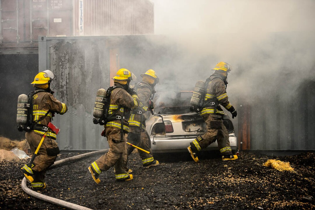 (Trent Nelson  |  The Salt Lake Tribune)  Unified Fire recruits in a live response to a vehicle and structure fire at the Unified Fire Authority Training Center in Magna on Tuesday April 16, 2019.