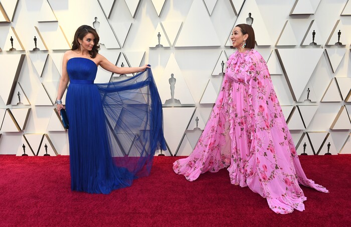 Tina Fey, left, and Maya Rudolph arrive at the Oscars on Sunday, Feb. 24, 2019, at the Dolby Theatre in Los Angeles. (Photo by Jordan Strauss/Invision/AP)