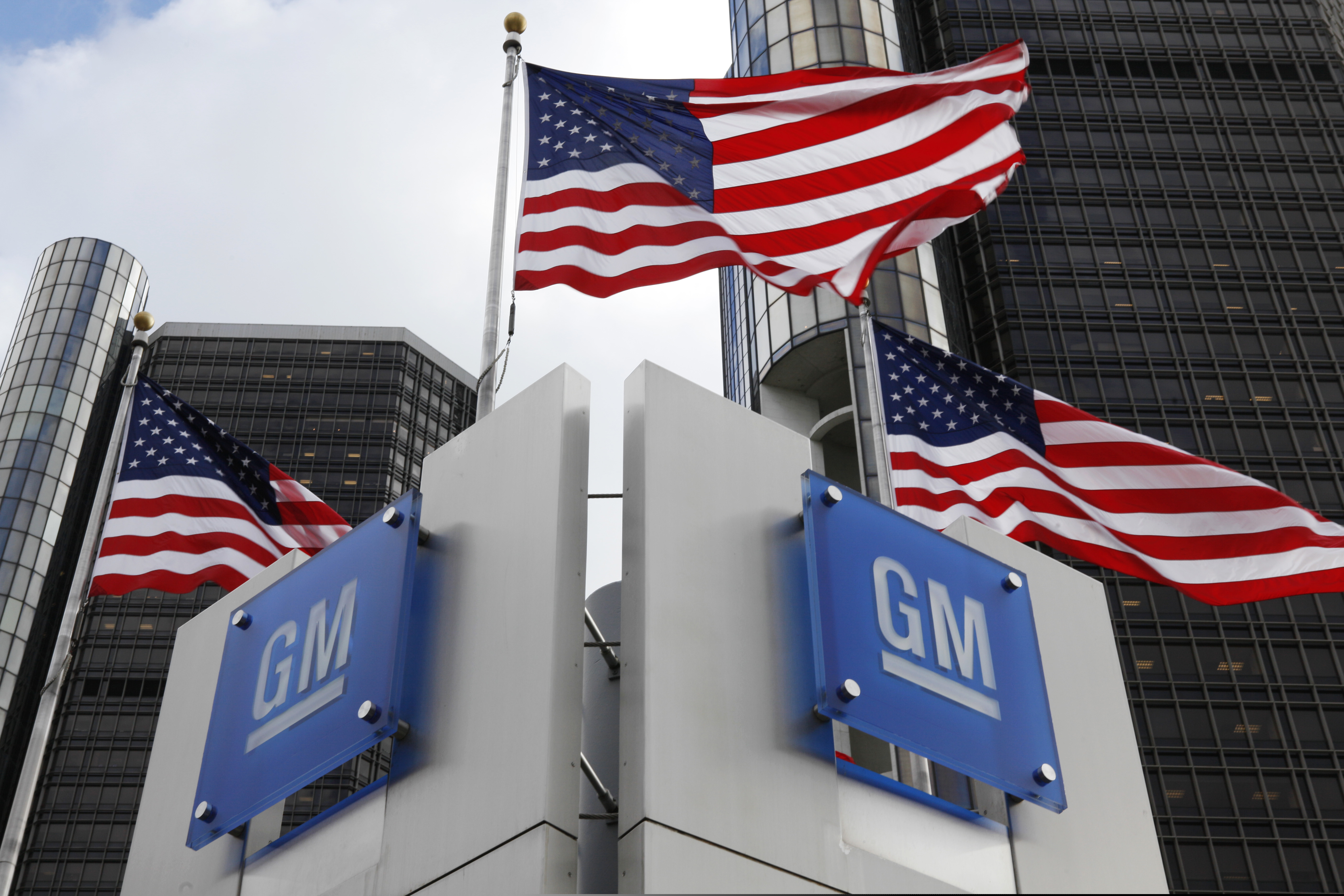 FILE- This Nov. 18, 2010, file photo shows the General Motors headquarters in Detroit. GM announced plans to shed 8,000 white-collar jobs, erasing the long-held notion that if you have an education, you’re immune from cyclical layoffs that used to be reserved for factory workers. (AP Photo/Paul Sancya, File)