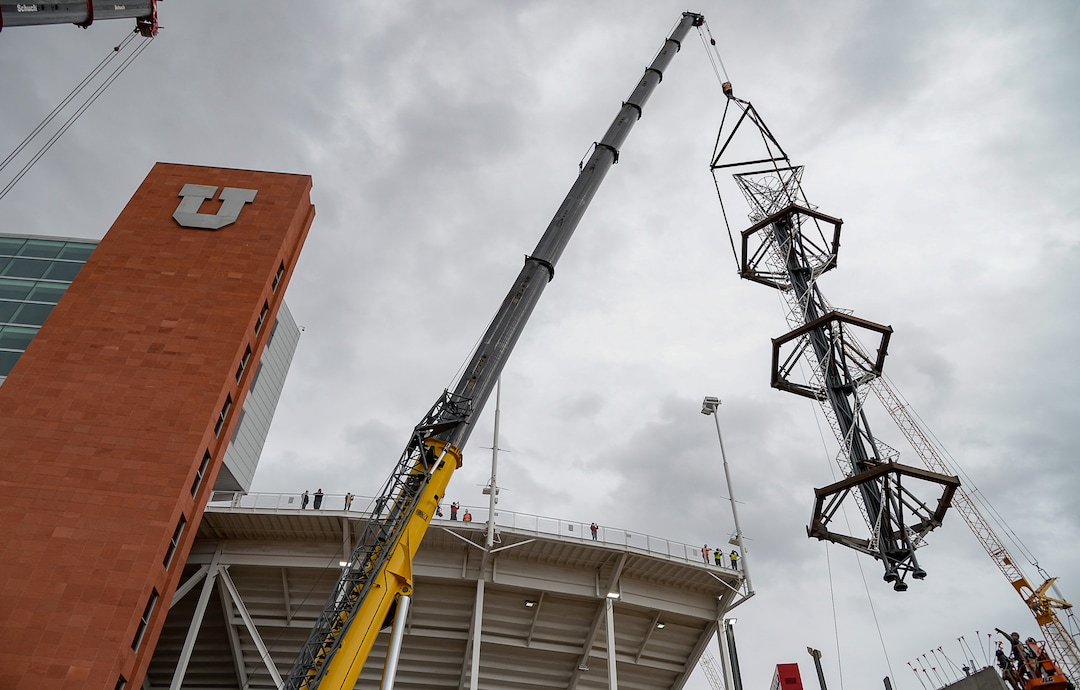 (Francisco Kjolseth  |  The Salt Lake Tribune) The Olympic cauldron is returned to the University of Utah on Friday, Jan. 29, 2021, after a refurbishment to lengthen its life span. Removed in February 2020, the cauldron was transported to an off-site location, where all 738 glass panes were removed and the complete structure was sandblasted and refinished. The refurbished structure was placed on a newly constructed, 17-foot-tall pedestal, just north of the stadium ticket office, with plans to add high-quality glass.