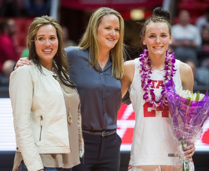 (Rick Egan  |  The Salt Lake Tribune)      Utah Utes guard/forward Tilar Clark (24) with mother Darla Arnold, and Utah Utes head coach Lynne Roberts as she his honored on senior night, in PAC-12 women's basketball action at the Jon M. Huntsman Center, Sunday, Feb. 18, 2018.