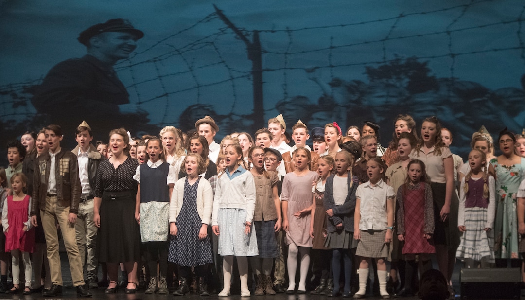 (Rick Egan  |  The Salt Lake Tribune) , Mueller Park Jr High students playing children from West Berlin sing the final song in their production of "The Berlin Candy Bomber" at Woods Cross High School, Saturday, November 11, 2017.