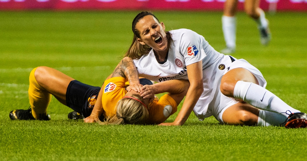 (Rick Egan  |  The Salt Lake Tribune)    Utah Royals FC midfielder Gunnhildur Jónsdóttir (66) collides with Portland Thorns FC defender Katherine Reynolds (2), in Soccer action between Utah Royals FC and Portland Thorns FC, in Sandy, Friday, July 19, 2019.