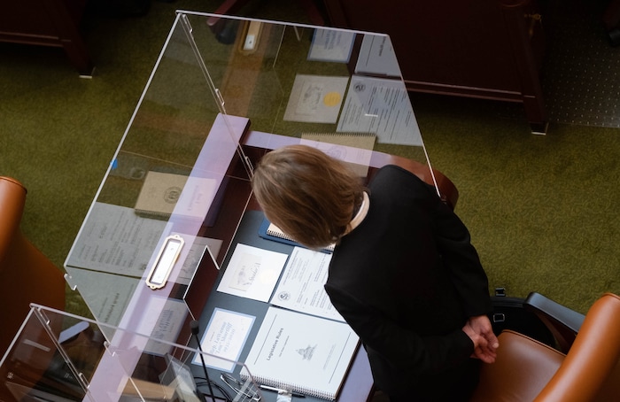 (Francisco Kjolseth  | The Salt Lake Tribune) The desks of members of the House of Representatives are separated by plexiglass to safeguard against the coronavirus for the start of the 2021 legislative session at the Capitol in Salt Lake City on Tuesday, Jan. 19, 2021.
