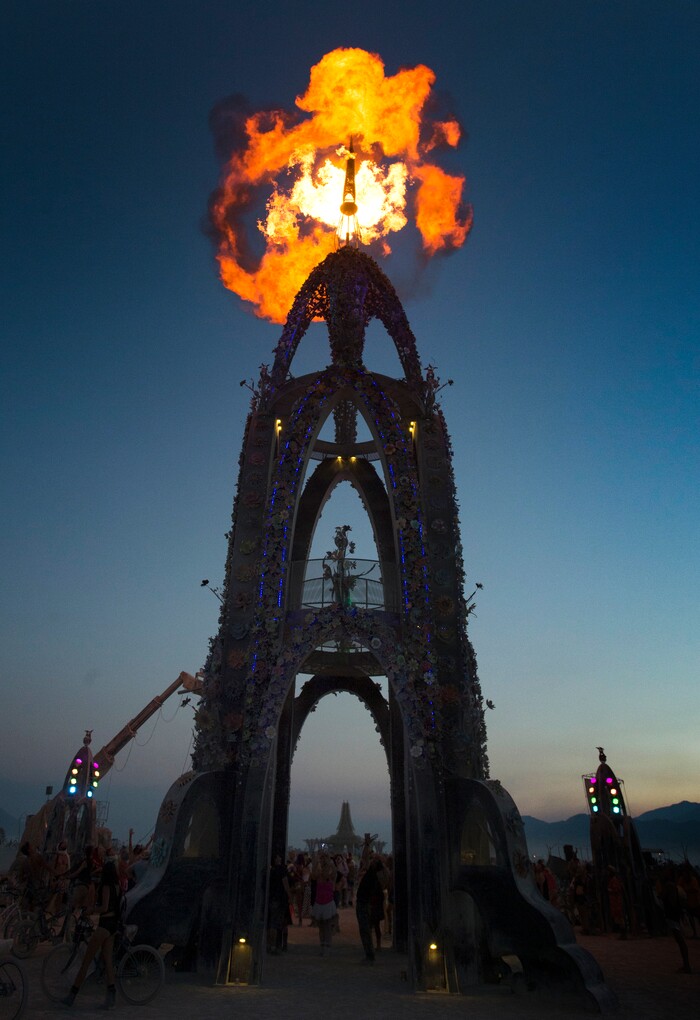 (Rick Egan  |  The Salt Lake Tribune)A blast of flame explodes from the top of "The Flower Tower," in the Black Rock Desert, during Burning Man.Friday, September 1, 2017.