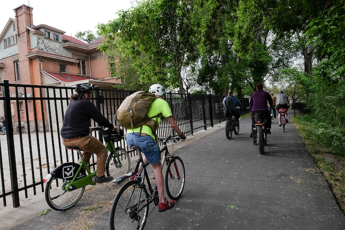 (Francisco Kjolseth | The Salt Lake Tribune) Salt Lake City Mayor Jackie Biskupski is joined by members of the public and city employees on Thursday, May 16, 2019, as part of the annual MayorÕs Bike to Work Day. This yearÕs ride began at the Northwest Recreation Center and ran primarily along the Jordan River Trail in an effort to show off the investments the city and others have made to the trail which passes right by the old Fisher Mansion and carriage house.