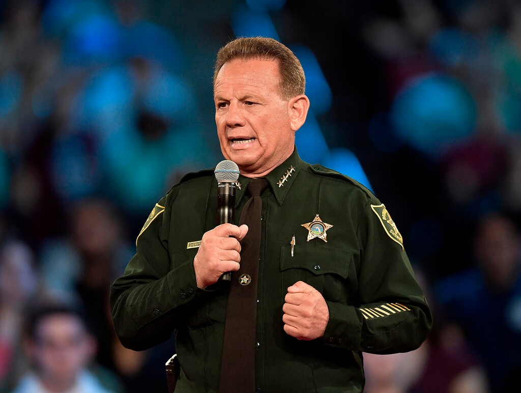 FILE - This Feb. 21, 2018 file photo, shows Broward County Sheriff Scott Israel speaking before a CNN town hall broadcast, at the BB&T Center, in Sunrise, Fla. New Florida Gov. Ron DeSantis suspended Broward County Sheriff Scott Israel on Friday, Jan. 11, 2019 over his handling of February’s massacre at Marjory Stoneman Douglas High School.(Michael Laughlin/South Florida Sun-Sentinel via AP, File)