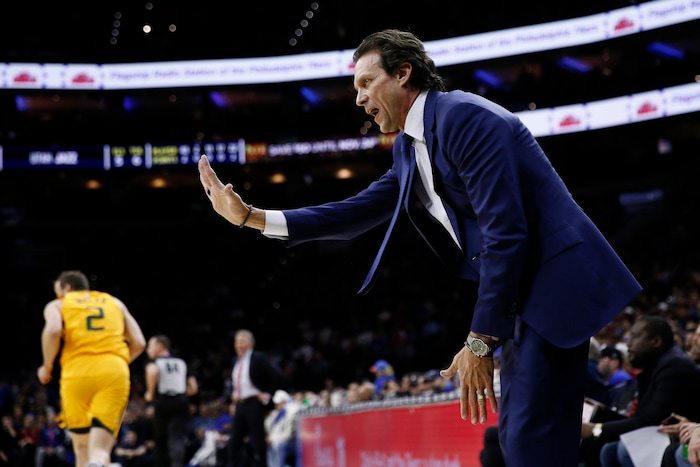Utah Jazz head coach Quin Snyder reacts to a call during the first half of an NBA basketball game against the Philadelphia 76ers, Monday, Dec. 2, 2019, in Philadelphia. (AP Photo/Matt Slocum)