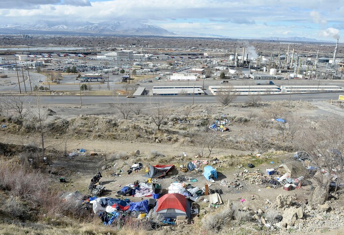 (Al Hartmann  |  The Salt Lake Tribune) 	
One of several homeless camps perched on the mountainside above Victory Road north of the state Capitol building.  Salt Lake City Police, Volunteers of America, Utah Highway Patrol, and social workers from Salt Lake City and the Veterans Administration had set up a mobile outreach center along Victory Road.