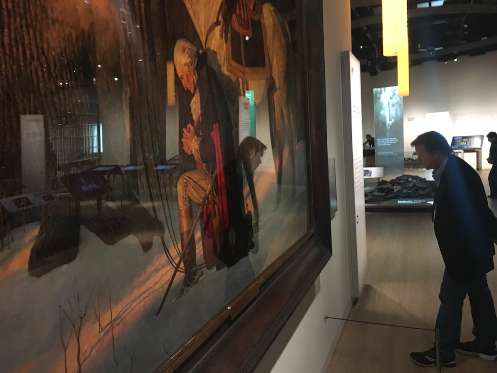 (Thomas Burr | The Salt Lake Tribune) A patron checks out the original painting of The Prayer at Valley Forge by the late Arnold Friberg at the Museum of the Bible in Washington, D.C. 