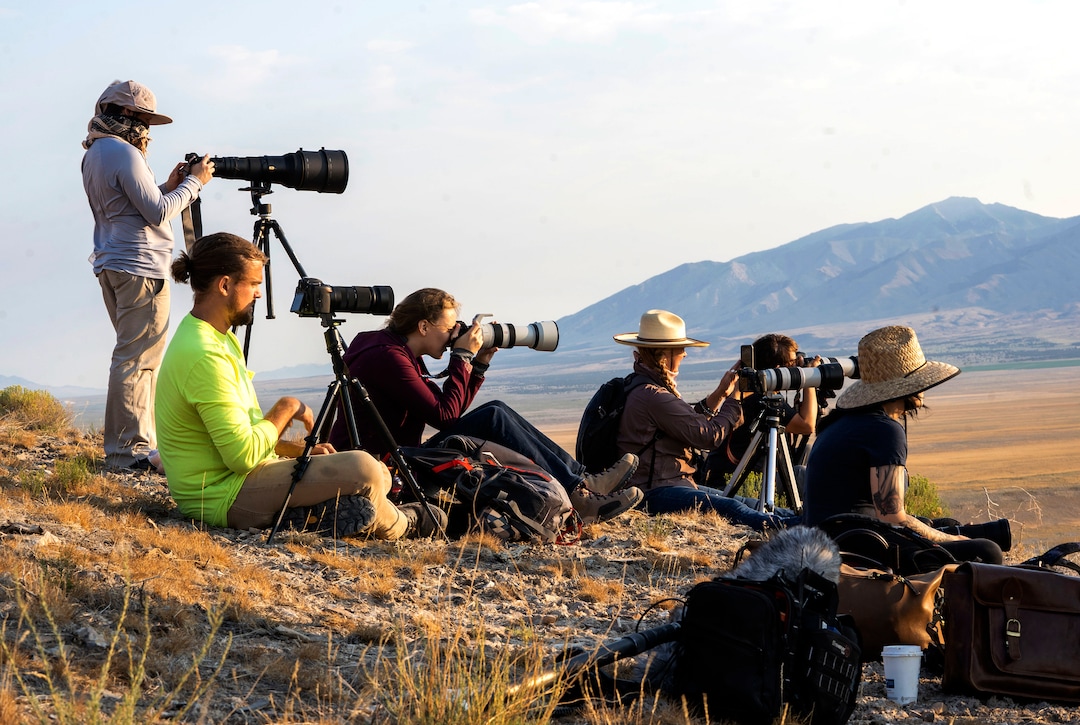 (Rick Egan | The Salt Lake Tribune) Wild Horse lovers and media observe as a helicopter rounds up wild horses during the Onaqui Herd Management Area wild horse gather on Wednesday, July 14, 2021.