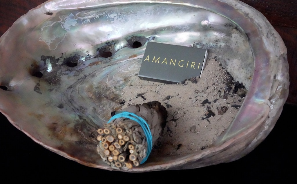 (Bethany Baker | The Salt Lake Tribune) A box of matches sits in an abalone shell dish, along with a bundle of white sage, in the spa at the Amangiri resort near Big Water, Utah, on Tuesday, July 11, 2023.