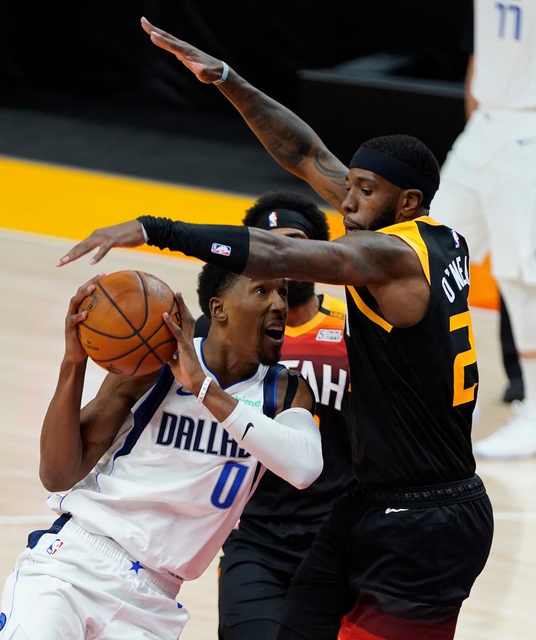 (Rick Egan | The Salt Lake Tribune)  Dallas Mavericks guard Josh Richardson (0) looks for a shot as Utah Jazz forward Royce O'Neale (23) defends, in NBA action between the Utah Jazz and the Dallas Mavericks at Vivint Arena, on Friday, Jan. 29, 2021.