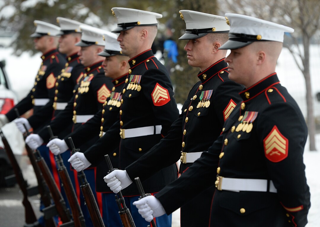 (Francisco Kjolseth  |  The Salt Lake Tribune)  Members of the Marine Corps attend police officer David Romrell's funeral services at Larkin Sunset Gardens Cemetery in Sandy, Wed. Dec. 5, 2018.