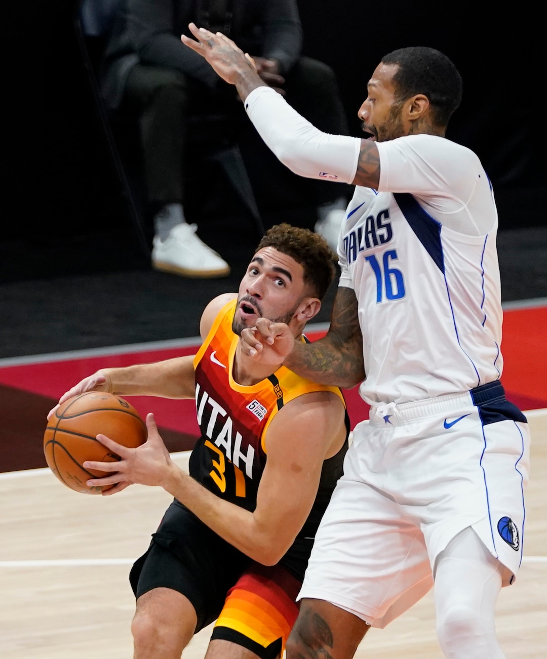 (Rick Egan | The Salt Lake Tribune)  Utah Jazz forward Georges Niang (31) goes up for a shot as Dallas Mavericks forward James Johnson (16) defends, in NBA action between the Utah Jazz and the Dallas Mavericks at Vivint Arena, on Friday, Jan. 29, 2021.