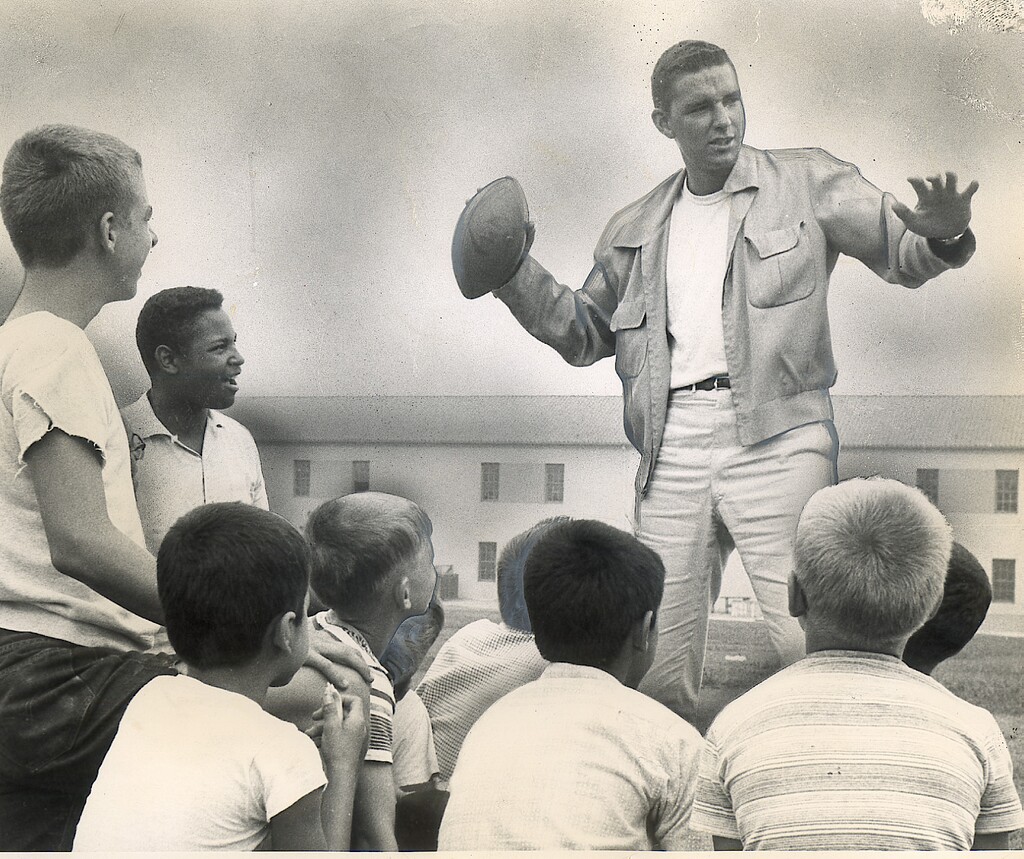 (Tribune file photo) Lee Grosscup demonstrates passing at a nearby playground in 1958.