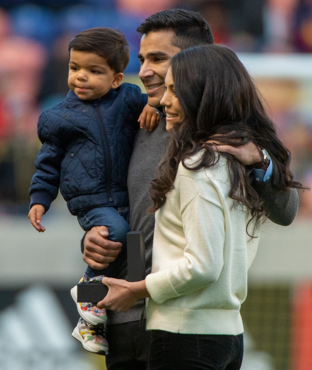 (Rick Egan  |  The Salt Lake Tribune)   Tony Beltran holds his son Kaito as he stands with his wife Teal, as he is honored at half time of the match between Real Salt Lake and Houston Dynamo  at Rio Tinto Stadium, Sunday, Sept. 29, 2019.