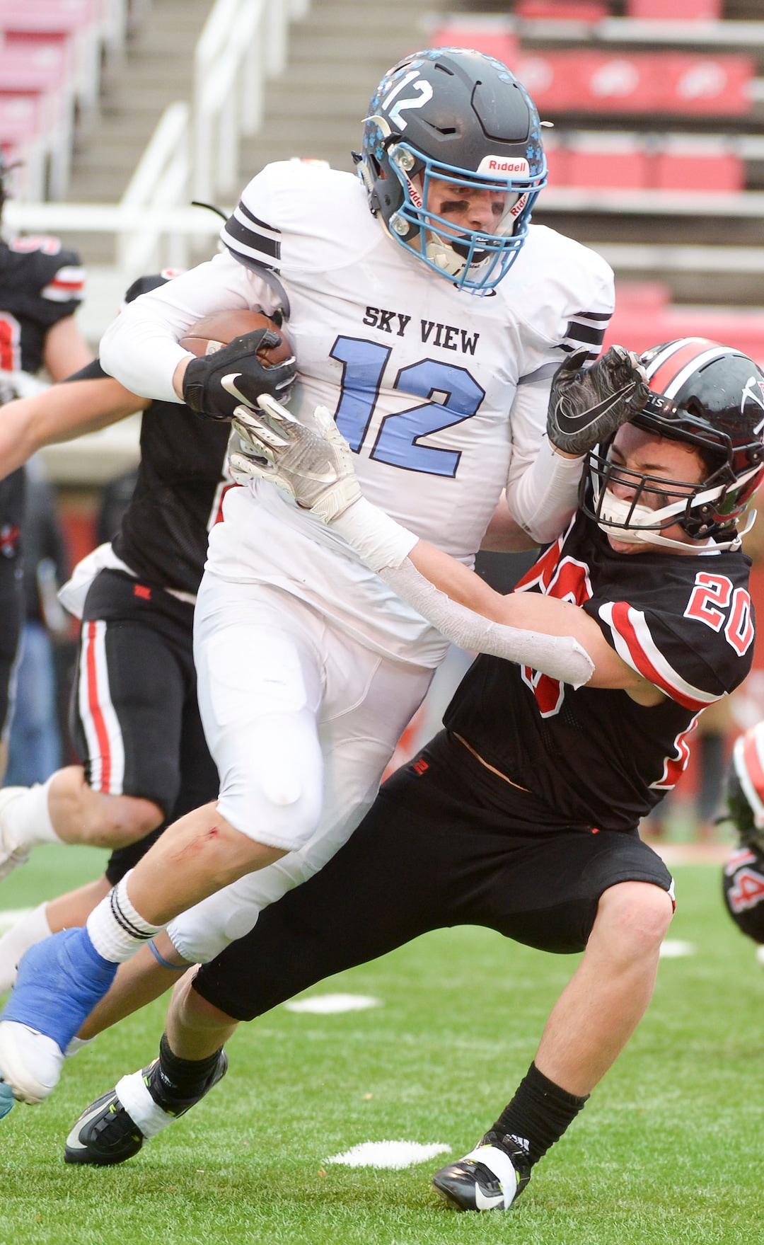 (Leah Hogsten  |  The Salt Lake Tribune)  Sky ViewÕs Mason Falslev plows down Park CityÕs Kirby Baynes. Sky View High School defeated Park City 35-0 to win the 4A State Championship football title, Nov. 11, 2019 at Rice-Eccles Stadium.