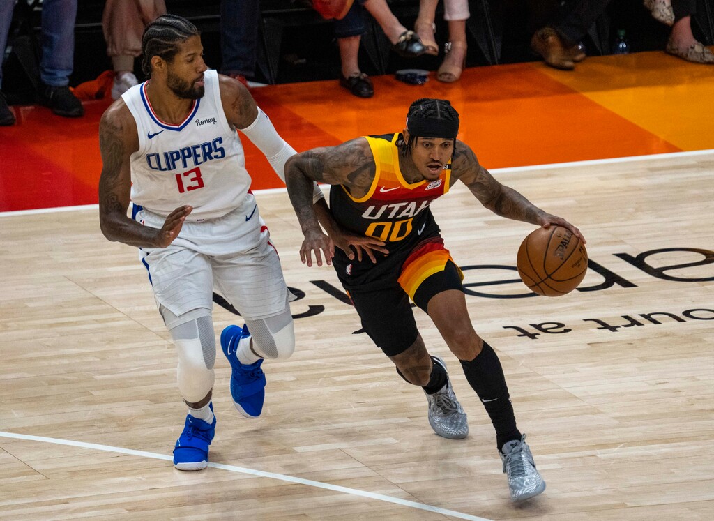 (Rick Egan | The Salt Lake Tribune) LA Clippers guard Paul George (13) defends Utah Jazz guard Jordan Clarkson (00) Game 2 of the Western Conference Semifinals at Vivint Arena, on Thursday, June 10, 2021.