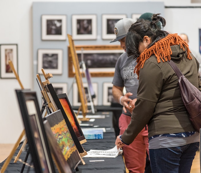 (Michael Mangum  |  Special to the Tribune) Patrons view competition pieces of art on display at an exhibition called Connect at the Urban Arts Gallery in Salt Lake City, UT on Friday, November 8th, 2019.