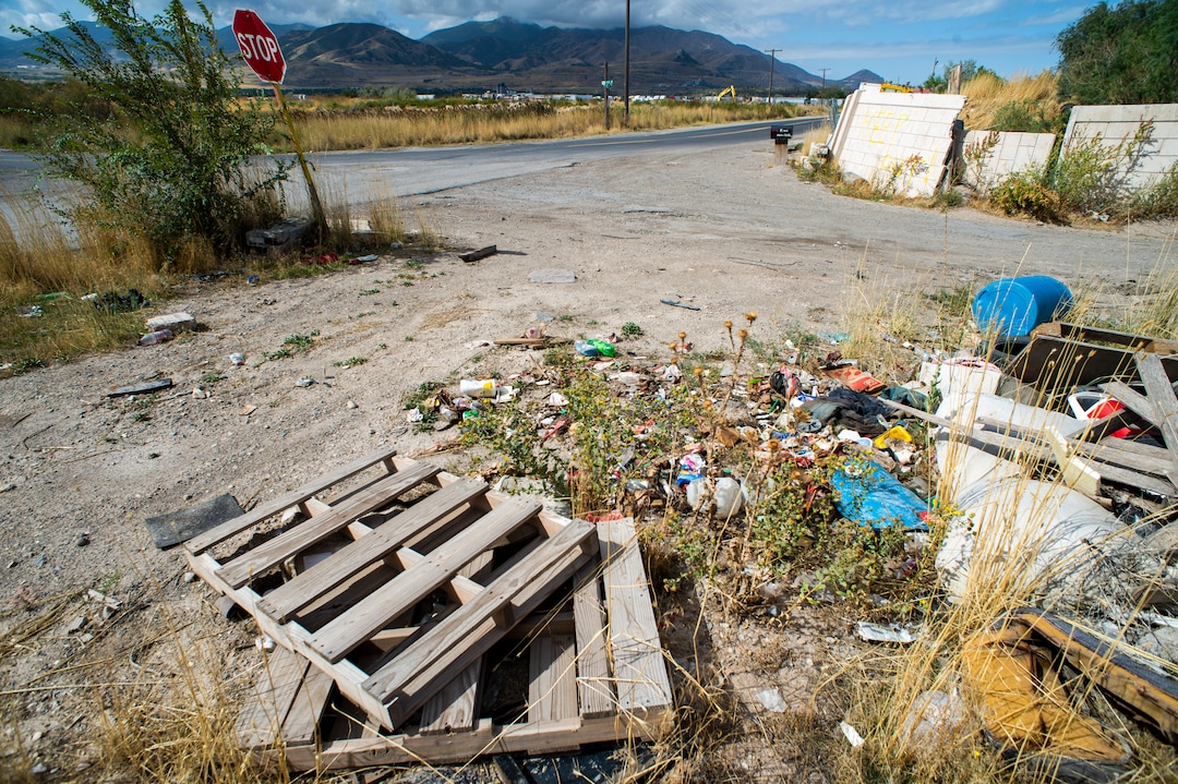 (Rick Egan  |  The Salt Lake Tribune)   Tires and garbage along 2100 South near 7200 West. The Salt Lake City Council is considering a temporary closure for a portion of road on 2100 South between 6500 West and 6900 West as a result of pervasive illegal dumping. Tuesday, Sept. 17, 2019.