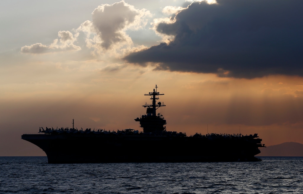 (Bullit Marquez | AP file photo)

In this April 13, 2018, file photo the USS Theodore Roosevelt aircraft carrier is anchored off Manila Bay west of Manila, Philippines.