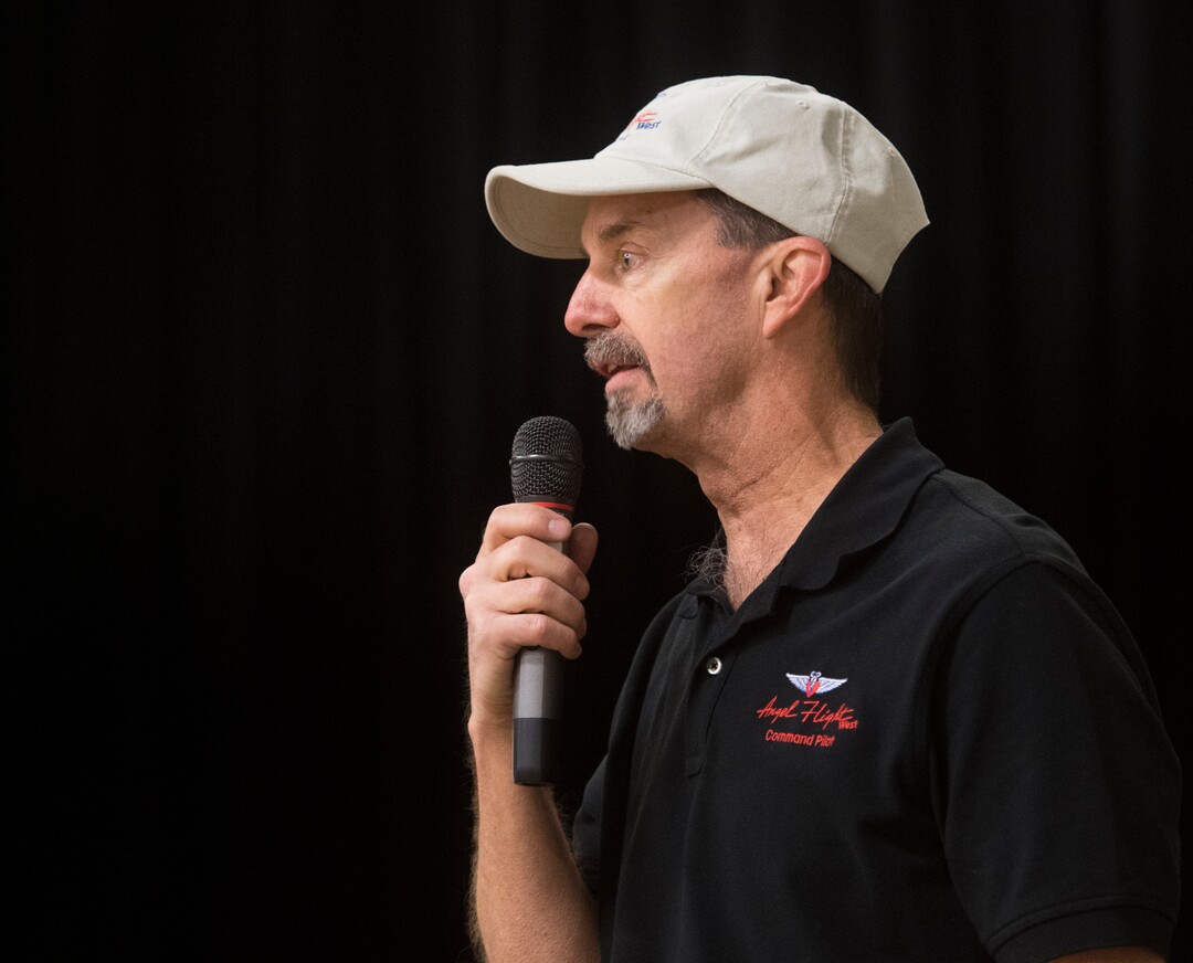 (Rick Egan  |  The Salt Lake Tribune) Steve Bollinger, Angel Flight West                                             talks to the students at Centennial Elementary School, in Roosevelt, Utah, as volunteer pilots from the Utah Wing of Angel Flight West, brought school supplies and gifts to students on their annual Santa Flight. Friday, December 8, 2017.