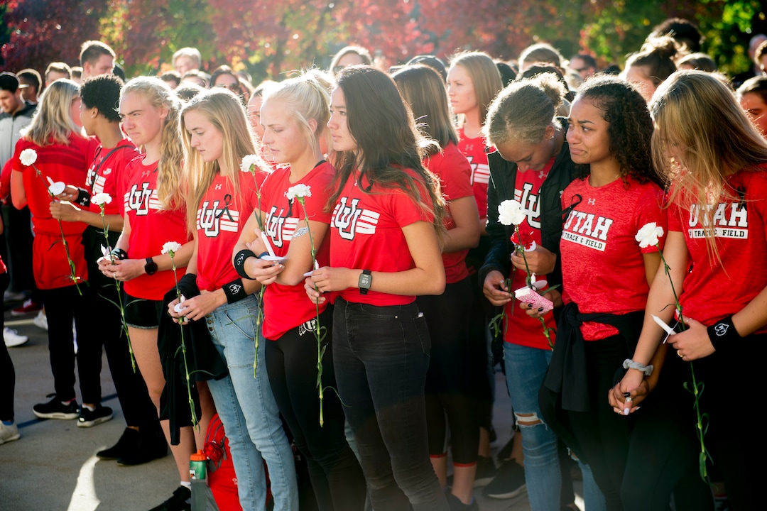 (Jeremy Harmon  |  The Salt Lake Tribune) Members of the University of Utah track team gather during a vigil for teammate Lauren McCluskey on Wed. Oct 24, 2018. McCluskey was killed on campus on Monday.