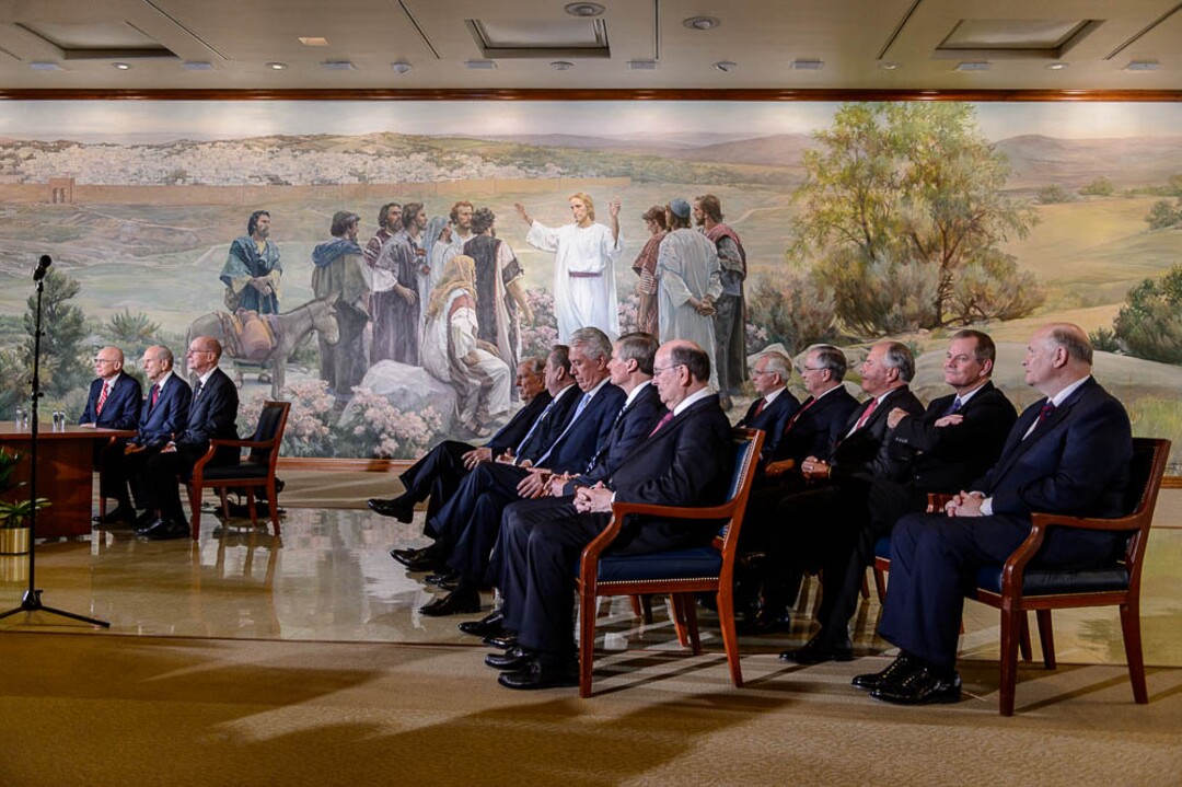 (Trent Nelson | The Salt Lake Tribune)  At left, Dallin H. Oaks, Russell M. Nelson, and Henry B. Eyring at a news conference in the lobby of the Church Office Building in Salt Lake City, Tuesday January 16, 2018. Nelson was named the 17th president of the nearly 16 million-member Church of Jesus Christ of Latter-day Saints. Oaks was named First Counselor in the First Presidency and Eyring Second Counselor in the First Presidency. Seated at right are members of the Quorum of the Twelve Apostles.