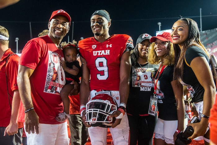(Chris Detrick | The Salt Lake Tribune) Utah Utes wide receiver Darren Carrington (9) poses for a pictures with his father Darren Carrington Sr., niece Serenity Carrington, mother Vickie Carrington, older sister Diara Carrington and younger sister DiJonai Carrington after the game at Rice-Eccles Stadium Thursday, August 31, 2017. Utah Utes defeated North Dakota Fighting Hawks 37-16.