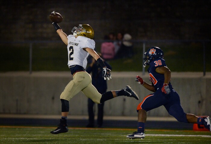 (Scott Sommerdorf   |  The Salt Lake Tribune)   
Skyline WR Briggs Binford makes a fingertip catch to help set up a field goal attempt late in the first half. Skyline held a 14-10 lead at the half over Brighton, Friday, September 15, 2017.