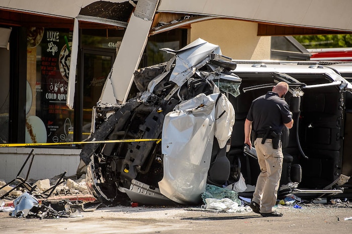 (Trent Nelson | The Salt Lake Tribune)
One person was killed, and several injured, when a car drove into a Starbucks parking lot and into a patio Friday June 8, 2018 in Holladay.