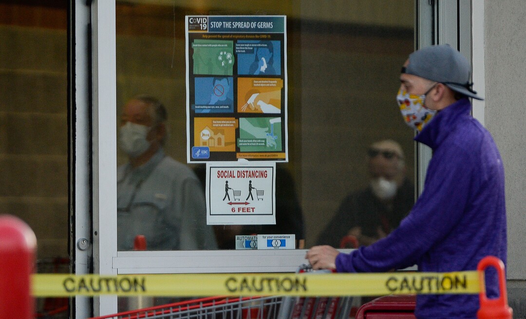 (Francisco Kjolseth  |  The Salt Lake Tribune) Costco begins implementing a policy on Monday, May 4, 2020, that everyone in the store, including shoppers, have to wear a mask, as people shop early in Salt Lake City during the coronavirus pandemic.