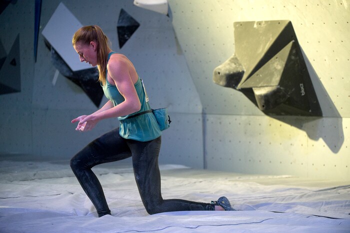 (Leah Hogsten  |  The Salt Lake Tribune) Claire Buhrfeind checks out her hands after falling while climbing a problem during USA Climbing's Bouldering Open National Championships at the Salt Palace Convention Center, Saturday, February 3, 2018 in Salt Lake City, UT. 

. 
