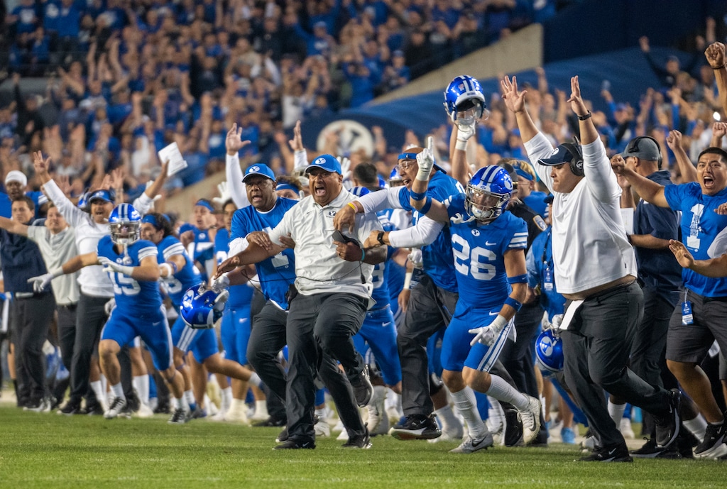 (Rick Egan | The Salt Lake Tribune) Brigham Young Cougars head coach Kalani Sitake celebrates as BYU upsets the Baylor Bears in double-overtime, at Lavell Edwards Stadium in Provo, on Saturday, Sept. 10, 2022.
