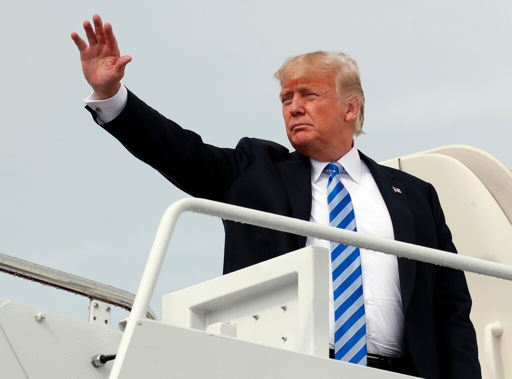 FILE - In this Tuesday, Aug. 21, 2018, file photo, President Donald Trump waves as he boards Air Force One at Andrews Air Force Base, Md., en route to West Virginia for a rally. Trump has been accused of dishonesty, spreading falsehoods, misrepresenting facts, distorting news, passing on inaccuracies and being loose with the truth. But does he lie? News organizations generally resist using the word because it requires them to judge a person's intent. (AP Photo/Alex Brandon, File)
