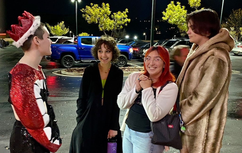 (Mark Eddington | The Salt Lake Tribune) Toni Graham, left, was a drag performer and featured in “We’re Here” talks with friends and well-wishers at the screening.