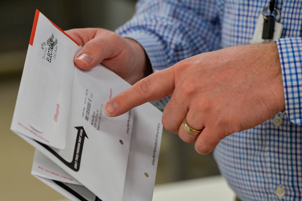(Chris Samuels | The Salt Lake Tribune) Davis County elections director Brian McKenzie explains the process of mail-in voting the Davis County ballot processing room in Farmington, Tuesday, Feb. 1, 2022.