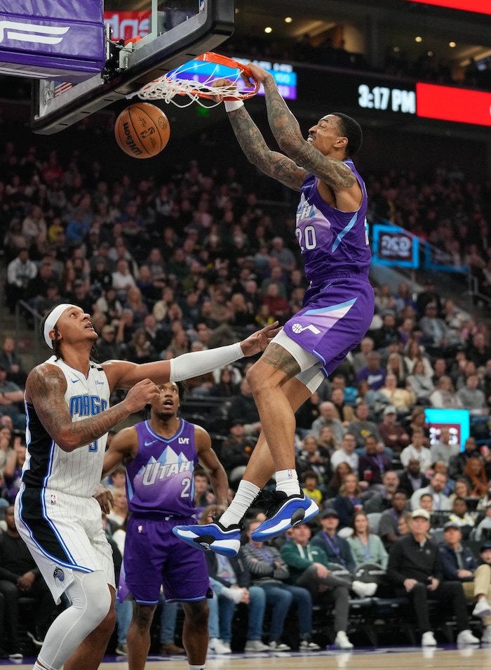 (Francisco Kjolseth  | The Salt Lake Tribune) Utah Jazz forward John Collins (20) makes a dunk as the Utah Jazz host the Orlando Magic during NBA basketball at the Delta Center in Salt Lake City on Saturday, February. 1, 2025.