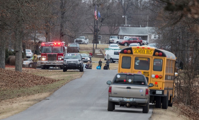 Emergency crews respond to Marshall County High School after a fatal school shooting Tuesday, Jan. 23, 2018, in Benton, Ky. Authorities said a shooting suspect was in custody. (Ryan Hermens/The Paducah Sun via AP)